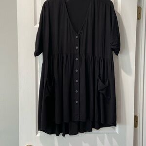 Black dress with button down front and 2 pockets. One Size